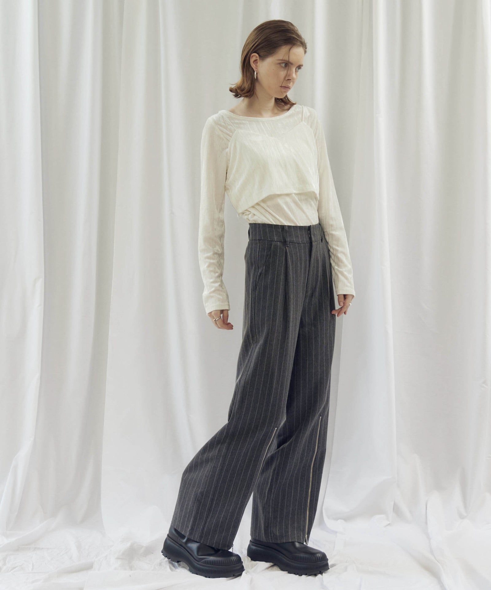 STRIPED ZIP SLIT PANTS(ストライプZIPスリットパンツ)