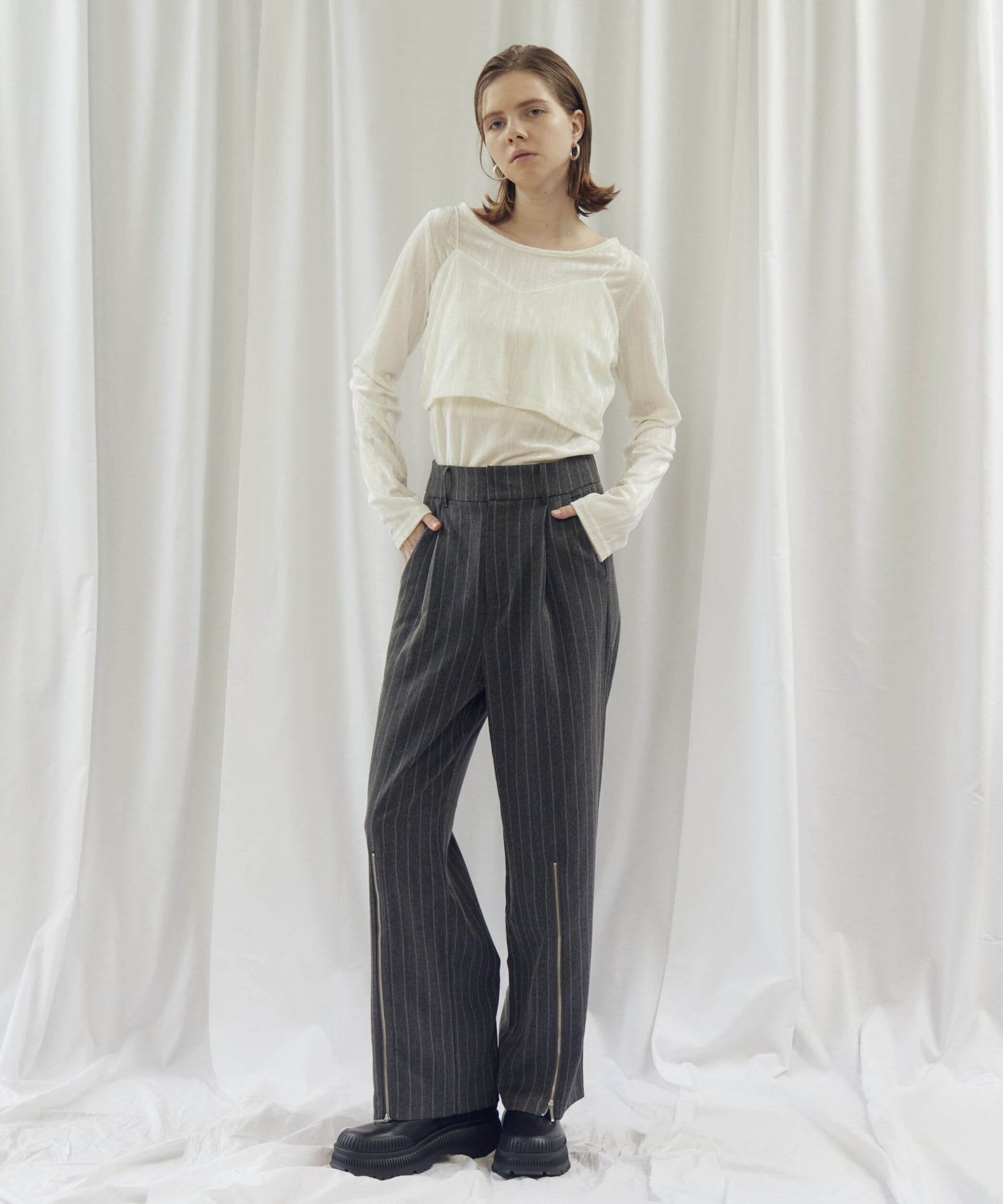 STRIPED ZIP SLIT PANTS(ストライプZIPスリットパンツ)
