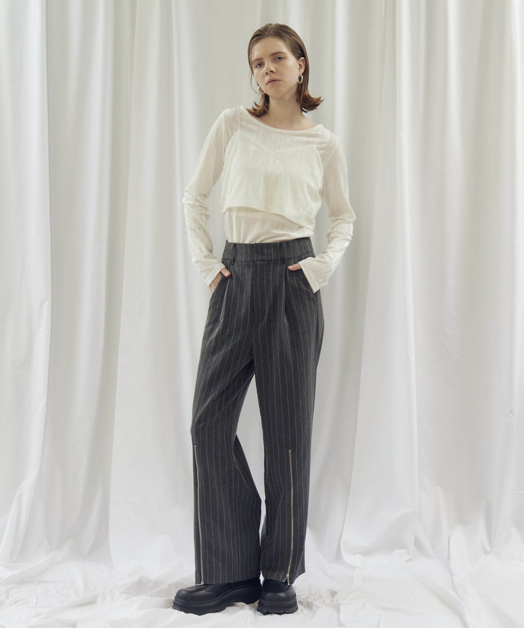 STRIPED ZIP SLIT PANTS(ストライプZIPスリットパンツ)