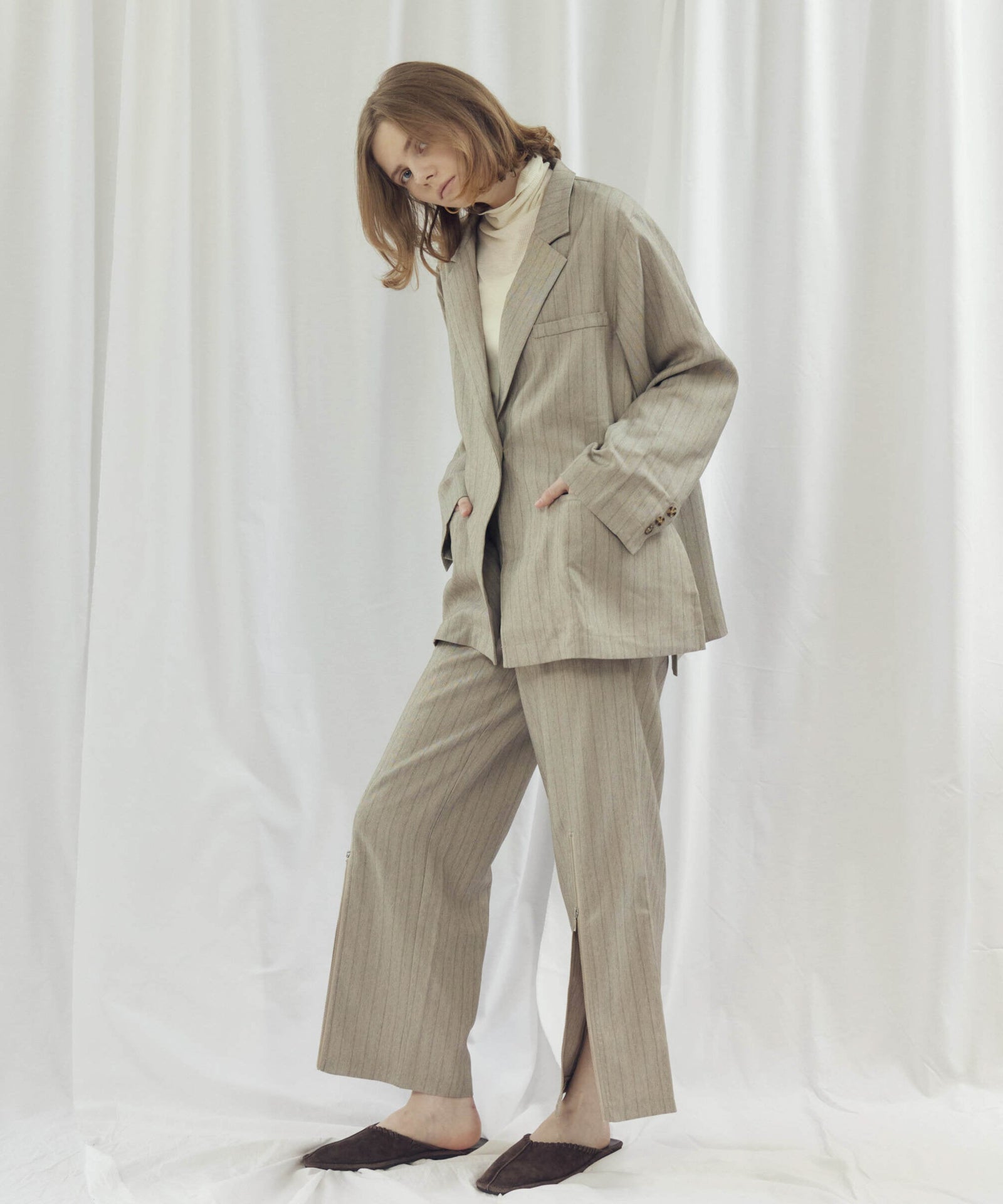 STRIPED ZIP SLIT PANTS(ストライプZIPスリットパンツ)