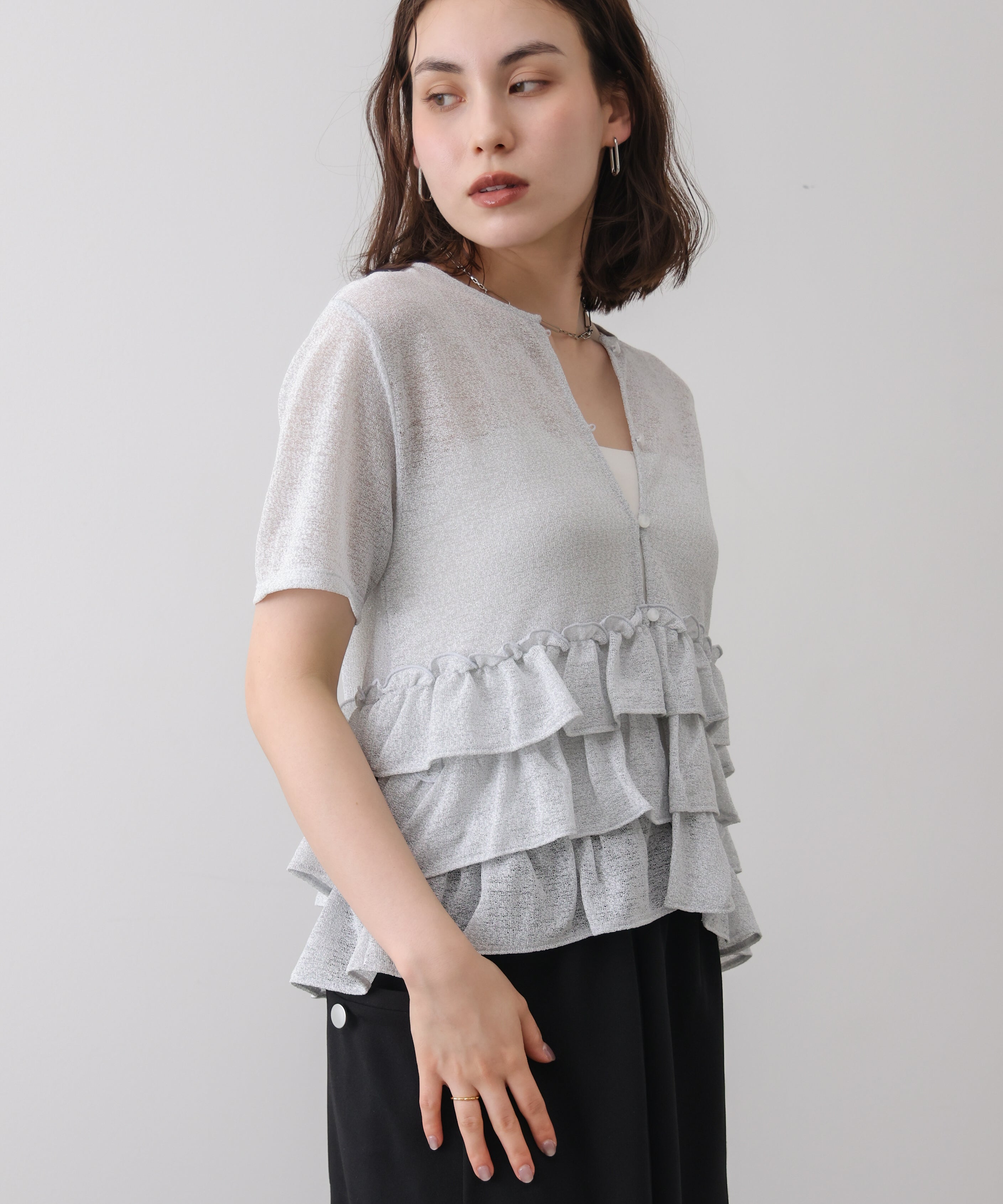 ラメ裾フリルカーディガン