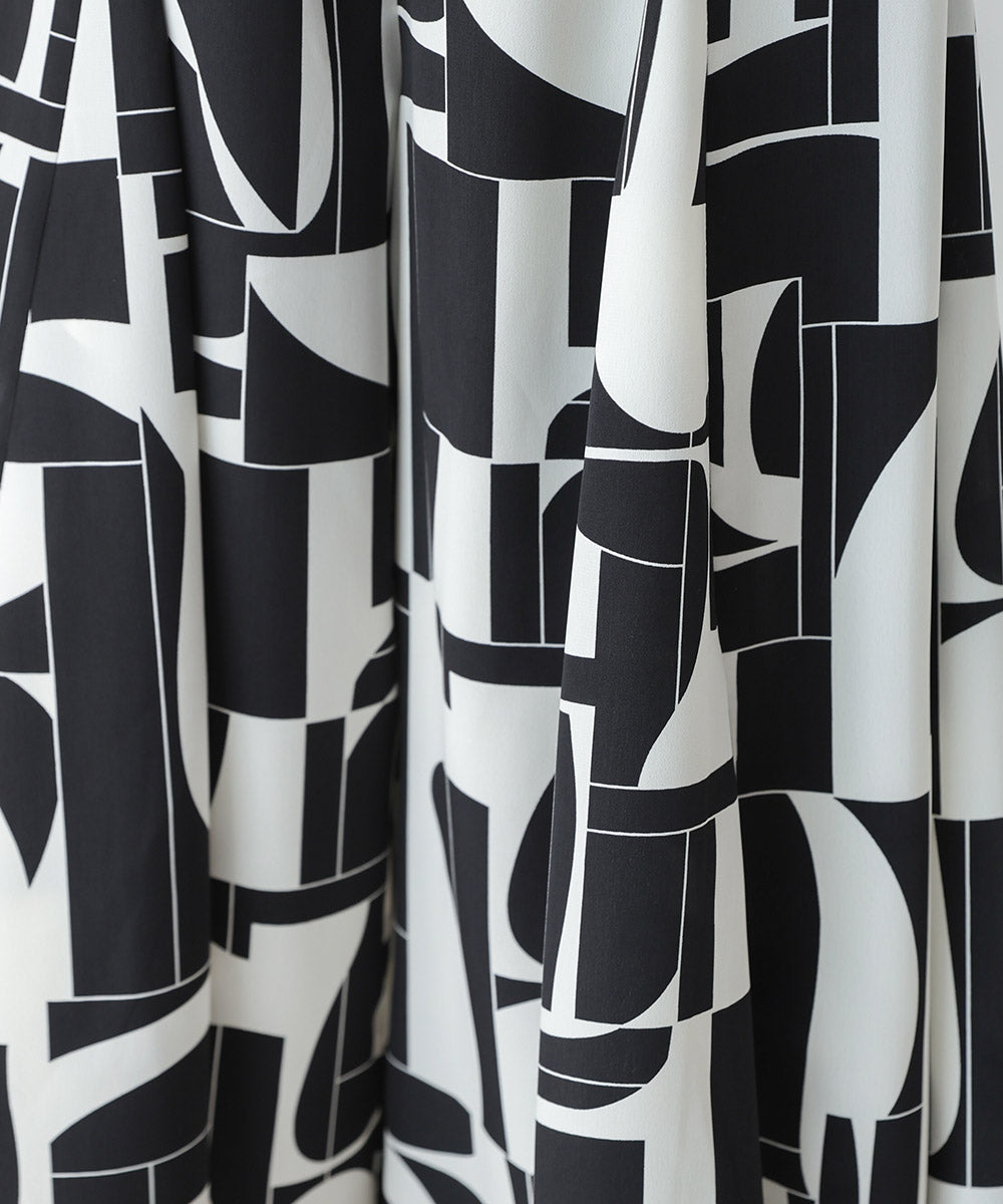 幾何学柄フレアパンツ