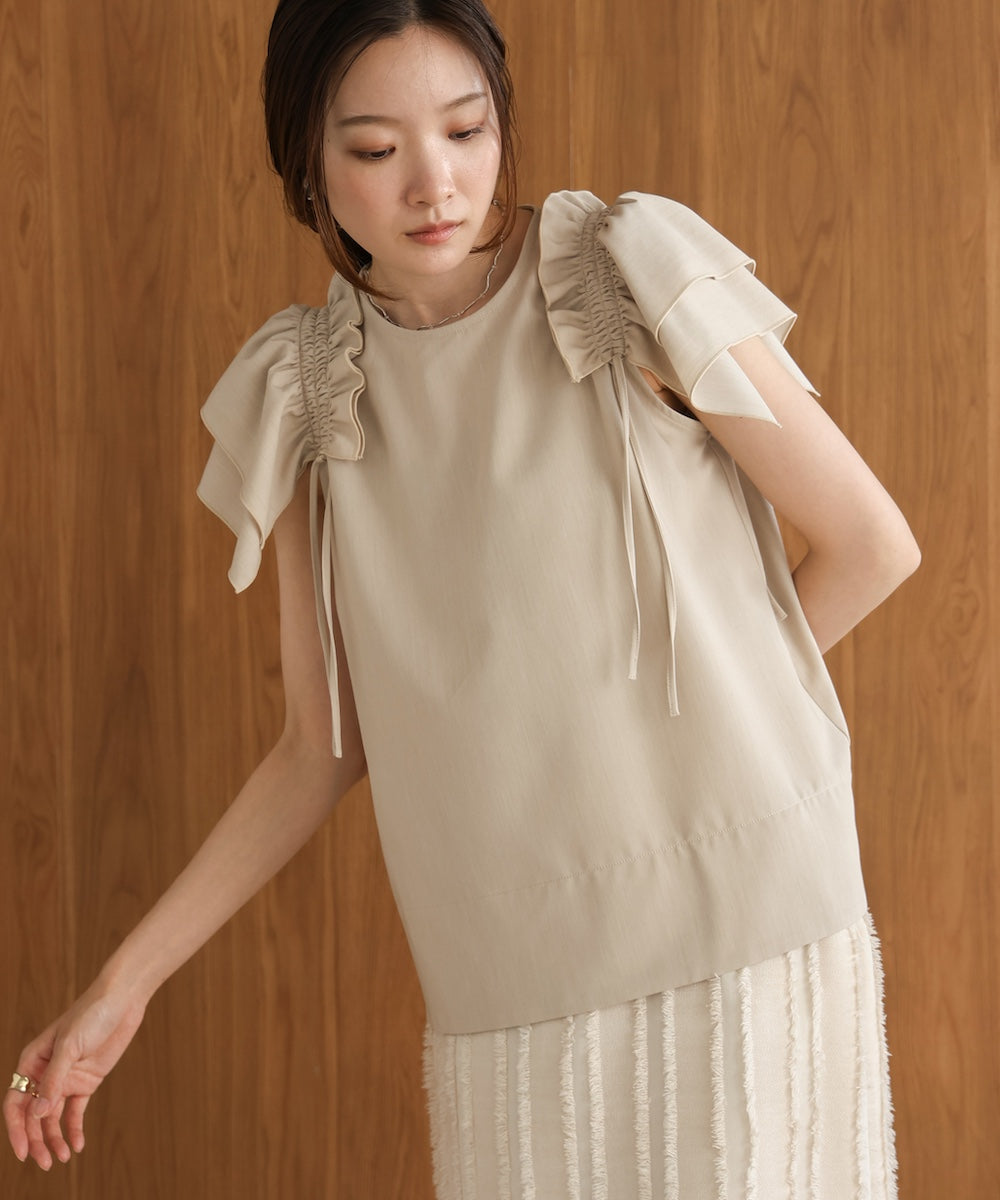 denim-like gathered blouse