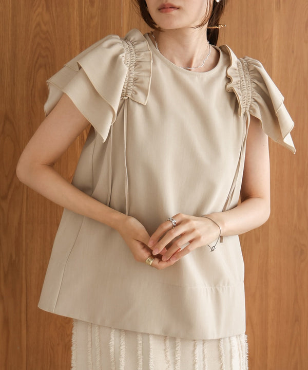 denim-like gathered blouse