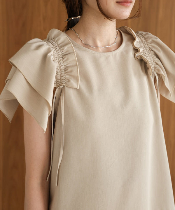 denim-like gathered blouse