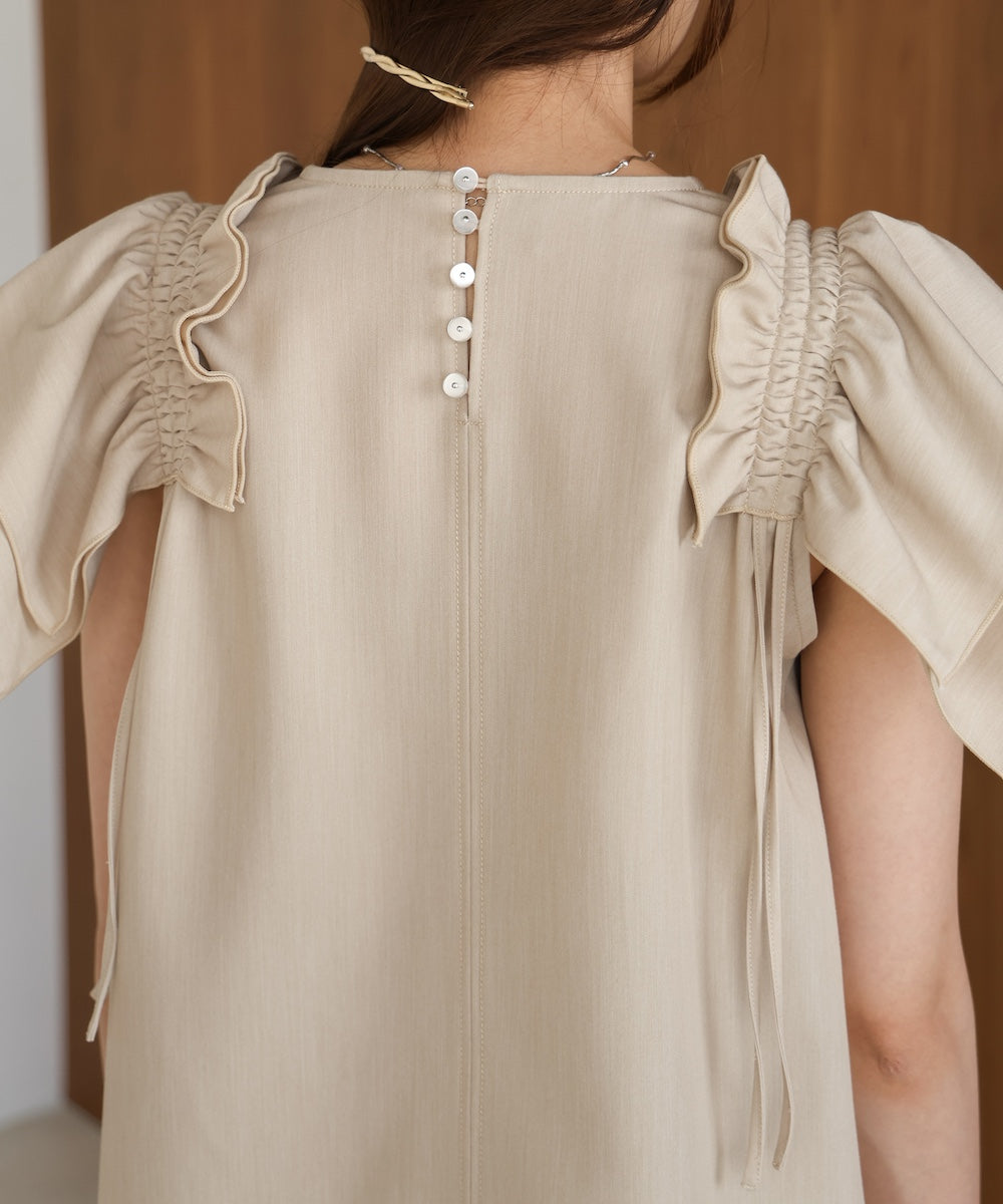 denim-like gathered blouse