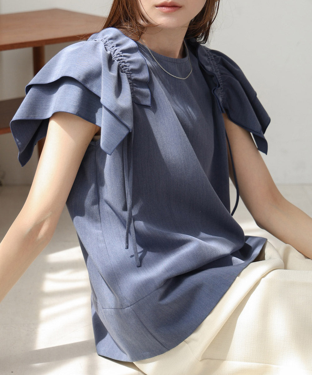 denim-like gathered blouse
