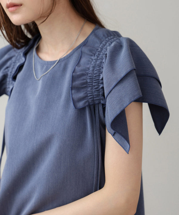denim-like gathered blouse