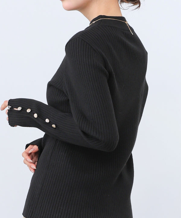 袖ボタンハイネックリブニットトップス