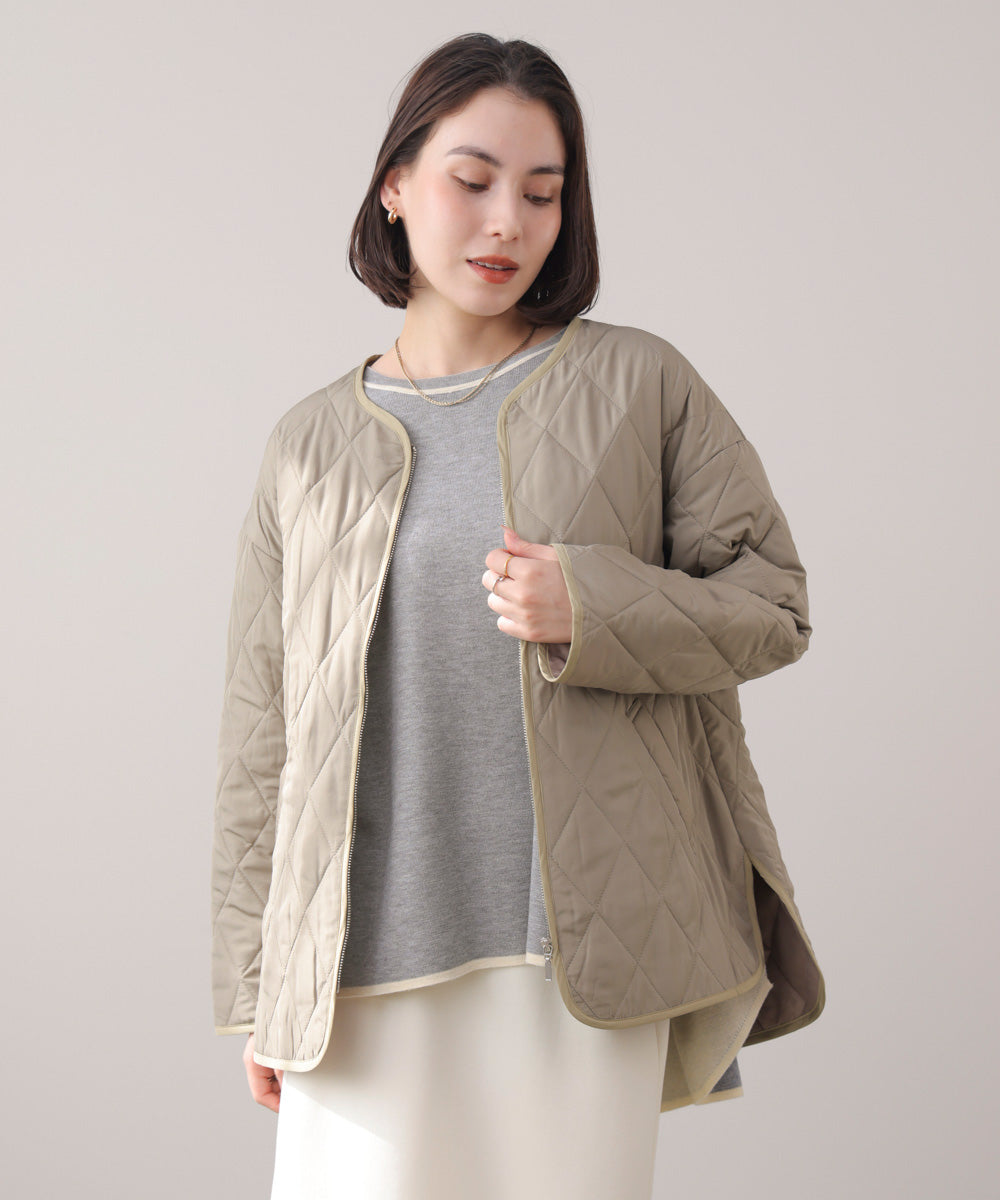 リバーシブルダブル丸首ポンチョ風ニット