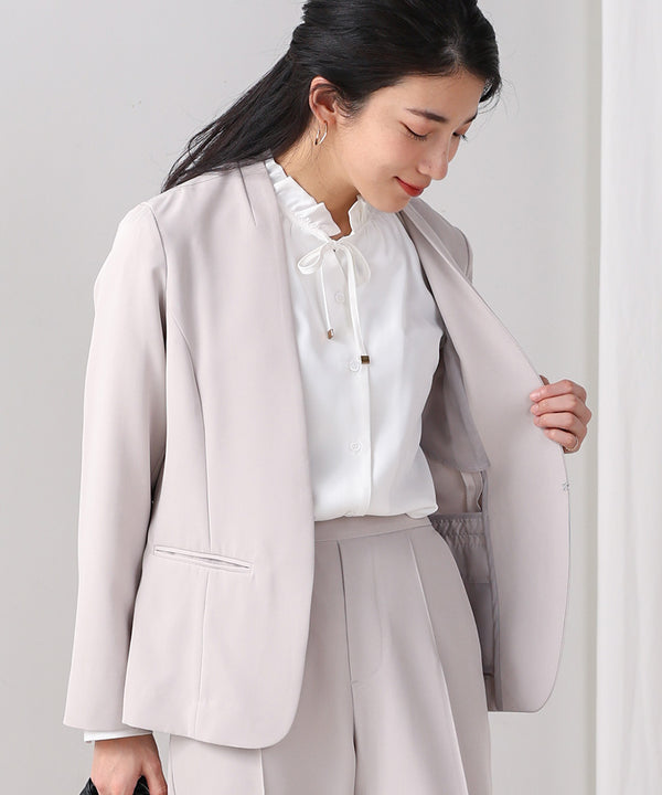 ドレープレーヨンシャーリングショルダーブラウス